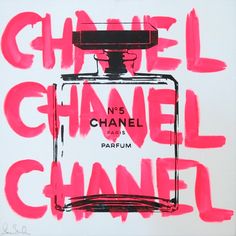 a chanel bottle with the words chanel on it in red and black ink