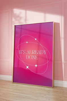 a pink poster with the words it's already done on it