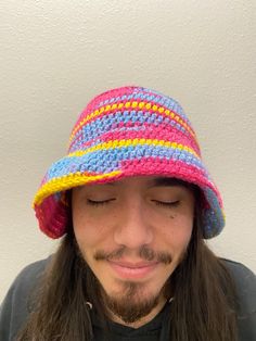 100% Cotton Bucket Hat in Pride Flag Color Schemes Handmade crocheted hat Size 1 head diameter is 20 in/50 cm Size 2 head diameter is 24 in/60 cm Casual Knitted Brimmed Mini Hats, Casual Cotton Yarn Beanie Hat, Casual Cotton Beanie Hats, One Size Fits Most Yarn Sun Cap, Yarn Bucket Hat One Size Fits Most, Cotton Yarn Cap Hat, Brimmed Crochet Hat With Yarn For Festival, Crochet Cap One Size Fits Most, Casual Brimmed Knitted Mini Hats