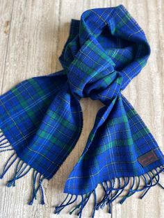 100% wool Davies Davis tartan scarf , woven in Wales. Rich blue and green traditional tartan, warm and cozy wool. Measures 10x58" Wool Handwoven Winter Scarves, Vintage Multicolor Winter Scarves, Green And Blue Plaid Scarf, Vintage Blue Scarves, Luxury Plaid Wool Scarves, Silk Purse, Tartan Scarf, Western Accessories, Belt Purse