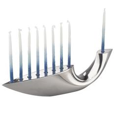 a menorah with blue candles in it