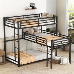 a bunk bed with two sets of mattresses on the bottom and one set below