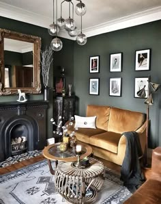 a living room filled with furniture and a fire place in front of a mirror on the wall