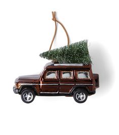 a car with a christmas tree on the roof