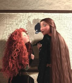 two women with long red hair standing next to each other in front of a mirror