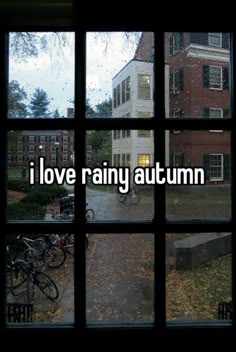 a window with the words i love rainy autumn written on it