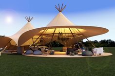 an artist's rendering of a tent set up in the middle of a field