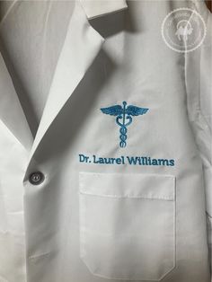 "VOLUME DISCOUNT: Available for this item on our website: https://camelsota.com/Custom-Embroidered-Red-Kap%C2%AE-Lab-Coat-p145807641 TEXT EMBROIDERY: Please enter text EXACTLY as you want it - the more characters you have the smaller your text will be. Approximate width of the left chest text will be 4\"-5\" above the pocket. Approximate width of the across back text will be 8\"-11\" between shoulders. Line 1 = Max 25 Char Line 2 = Max 25 Char Line 3 = Max 25 Char Please specify font and thread Lab Coat Photoshoot, Lab Coat Aesthetic, Custom Lab Coat, Monogram Robes, Doctor Coat, White Lab Coat, Text Embroidery, Medical Lab, Terry Robe