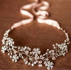 a close up of a tiara on a table