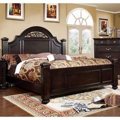 a bedroom scene with focus on the bed and dresser