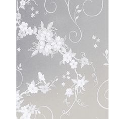 white flowers and swirls are on a gray wallpaper with silver foiled paper