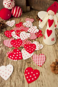 some red and white hearts are on the table