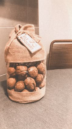 a bag filled with nuts sitting on top of a counter