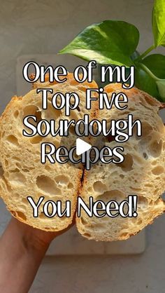 someone holding up a piece of bread with the words, one of my top five sourdough recipes you need