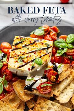 baked feta with cherry tomatoes and basil on a plate next to sliced bread slices