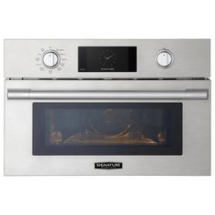 a stainless steel microwave oven with the door open and its light on, in front of a white background