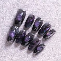 Unleash your inner star with our **Galaxy Press-On Nail Set This mesmerizing collection features a stunning blend of deep black and vibrant purple, creating a cosmic design that captures the beauty of the universe. 🌟 Material: Our press-on nails are made from high-quality materials to ensure durability and a long-lasting wear. Expect: 1-2 Days with adhesive tabs (included) Up to 3 Weeks with nail glue Proper care and following the included instructions will allow you to reuse your nails multiple times. 🌟 Sizes Available: XS: 14mm, 10mm, 11mm, 10mm, 8mm S: 15mm, 11mm, 12mm, 11mm, 9mm M: 16mm, 12mm, 13mm, 12mm, 10mm L: 17mm, 13mm, 14mm, 13mm, 11mm Custom sizing is available! Fill out the personalization section or contact us for assistance in finding your perfect fit. 🌟 Each Nail Set Incl Black And Purple Nails, Cosmic Nails, Cosmic Design, Purple Goth, Our Galaxy, Galaxy Nails, Goth Nails, Nail Glue, Purple Nails