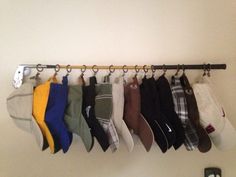 there are many pairs of socks hanging on the wall