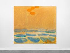 an abstract painting hangs on the wall in front of a white room with concrete flooring