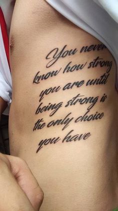 a woman's stomach with the words you never know how strong you are and being strong is the only choice you have