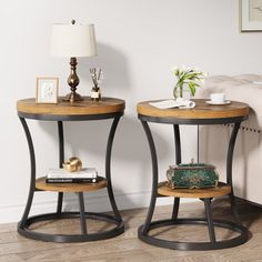 two tables with books on them in a room next to a couch and coffee table