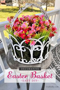 a basket filled with pink flowers sitting on top of a white porch chair next to a black and white rug