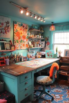 a room with a desk, chair and shelves filled with crafting supplies on the wall