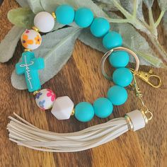 Get your wristlet keychain from Craft Haven Handmade! I use high-quality silicone beads, elastic, and metal key rings. These are great for everyday use or as a gift.   If you have questions, please don't hesitate to ask. Wristlet Keychain, Silicone Beads, Ring Bracelet, Key Rings, Ring, Bangles, Beads, Gifts