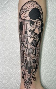 a black and white tattoo on the leg of a woman with an abstract design in it