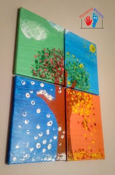 four colorful paintings on canvass with trees and moon in the sky, one is painted