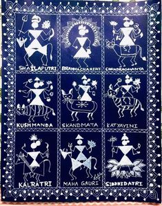 a blue and white quilt with different designs on it's sides, including an image of people