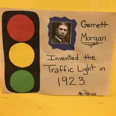 a bulletin board with a traffic light and a sign on it that says, garrett morgan inventor the traffic light in 1932