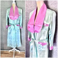 "More from the estate full of wonderful Asian textiles, this lovely robe looks to be unworn - original creases from folding, a couple of storage scuffs. Great mint, seafoam green with pink lapels , cuffs and pockets, delicate braid piping. MEASUREMENTS: will fit most Shoulder to shoulder: 18\" Sleeves: 19\" Bust, waist, hips : to 40\" Shoulder to hem: 46\" FABRIC (S): rayon CONDITION : very good, as noted ERA: 1940s, 1950s LABEL - none Please do not hesitate to ask any and all questions prior to Vintage Long Robe For Daywear, Long Vintage Robe For Daywear, Vintage Long Fitted Robe, Long-sleeved Pink Vintage Robe, Fitted Vintage Robe For Daywear, Vintage Long Sleeve Robe For Daywear, Japanese Souvenir, Asian Textiles, Womens Robes