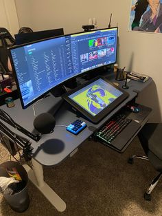 a computer desk with two monitors, keyboard and mouse