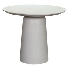 a white table with a round top on a white background