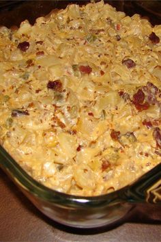 a casserole dish with cheese and other toppings