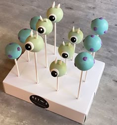 there are many cake pops with eyes on them