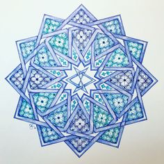 a drawing of a blue and white flower with many smaller flowers on it's center