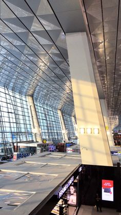 the inside of an airport with lots of windows