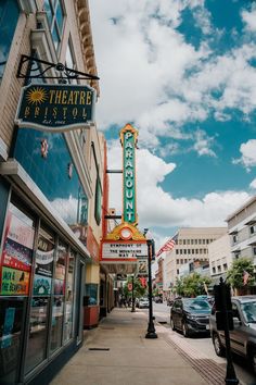 a theater sign on the side of a building