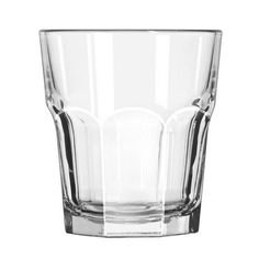 an empty shot glass on a white background with the words duratuff above it