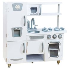 a white wooden play kitchen with sink, stove and oven in front of a white background