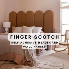 a bed sitting in a bedroom next to a window with the words finger scotch on it