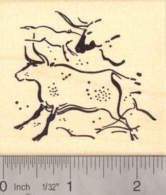 a rubber stamp with a drawing of a horse on it's back and legs