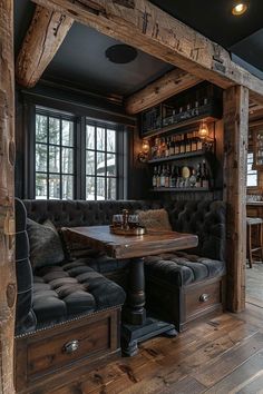 a rustic living room with wooden beams and leather couches, built into the wall