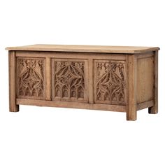 an old wooden cabinet with carvings on it