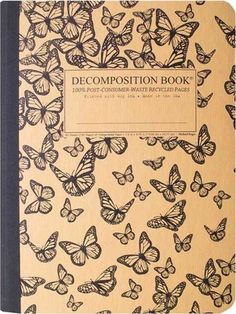 a brown and black book with butterflies on it