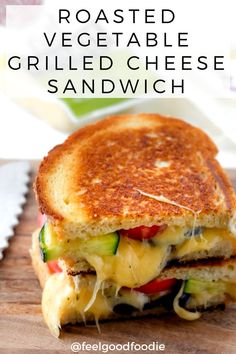 a grilled cheese sandwich on a cutting board with the words roasted vegetable grilled cheese sandwich