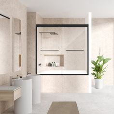 a modern bathroom with two sinks and a large mirror above the sink, along with a potted plant