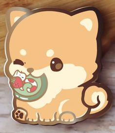 a sticker with a cat holding a fish in it's mouth, on top of a wooden surface